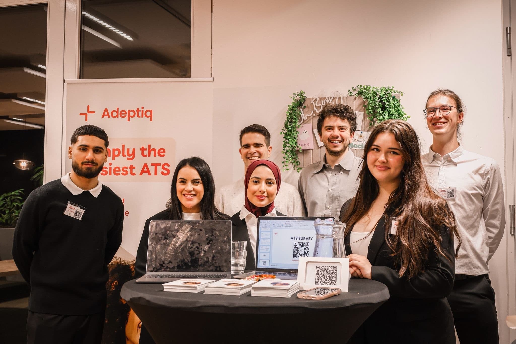 Photo of the Adeptiq team and students on the Discover More event.
